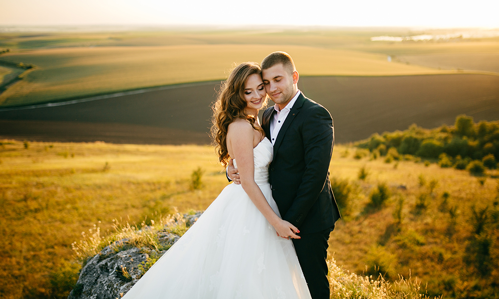 beautiful wedding couple posing in nature